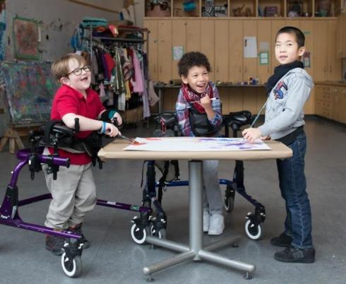 Kids in the art studio making work.