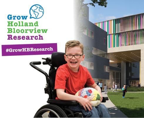 A young boy who uses a wheelchair and wearing a red tshirt and glasses holds a model brain. Behind him is a building structure. Text reads Grow Holland Bloorview Research. 