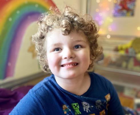 Holland Bloorview client, Phoenix, smiling at the camera. 