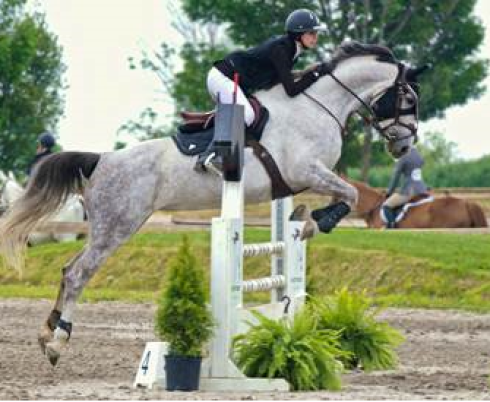 Zoe horse jumping.