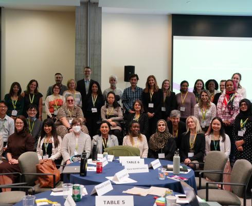 group of adults - family leaders, researchers and staff in a conference room