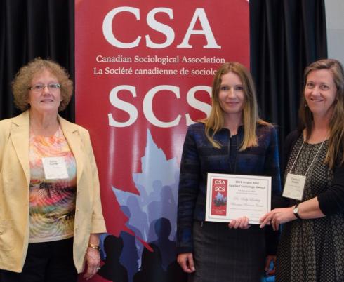 Sally Lindsay (centre) receives her award from Linda Gerber (left, CSA President) and Tracey Adam (right, one of her nominators)