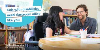 A youth and teacher are looking at each other seated at a classroom table 